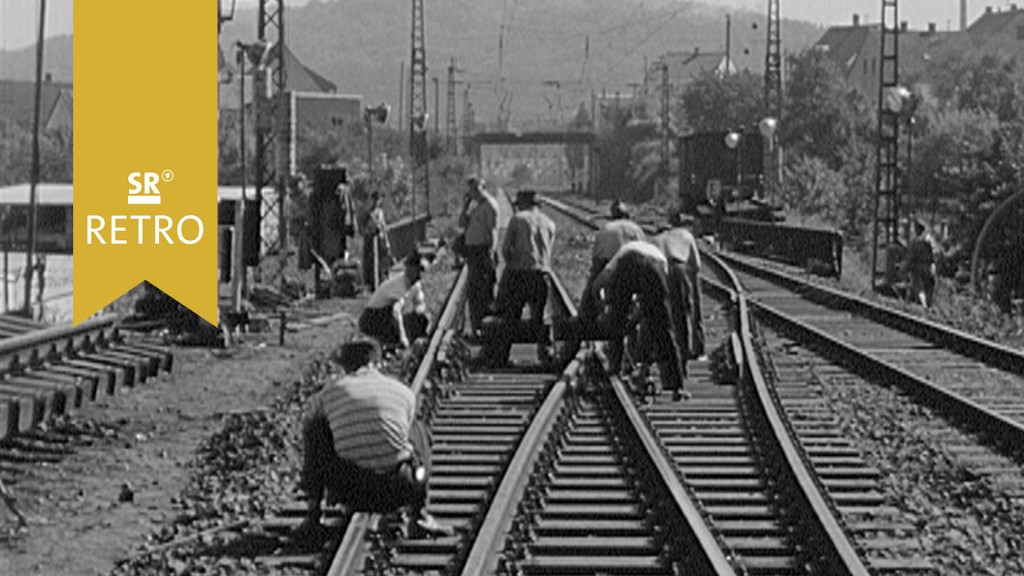 Foto: Bahngleise mit Arbeitern