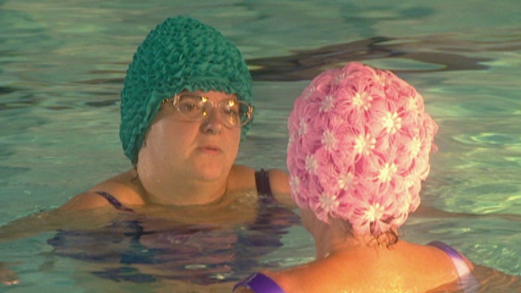 Foto: Familie Heinz Becker - Hilde mit Badekapp im Wasser