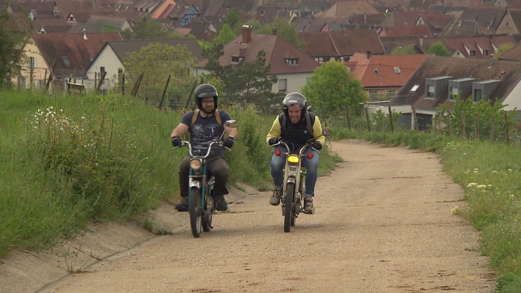 Foto: Zwei Männer mit Solex.