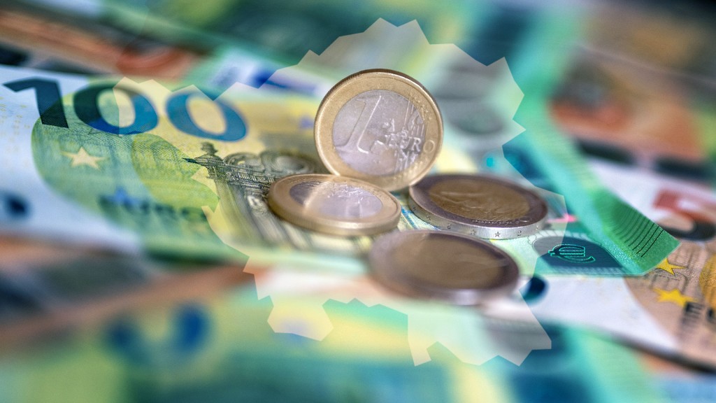 Geldscheine und Münzen liegen auf einem Tisch, darüber sind die Umrisse des Saarlandes gelegt