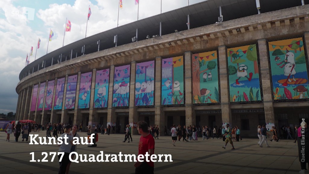 Foto: Olympiastadion in Berlin mit Kunst von Comic-Künstlerin Valérie Minelli