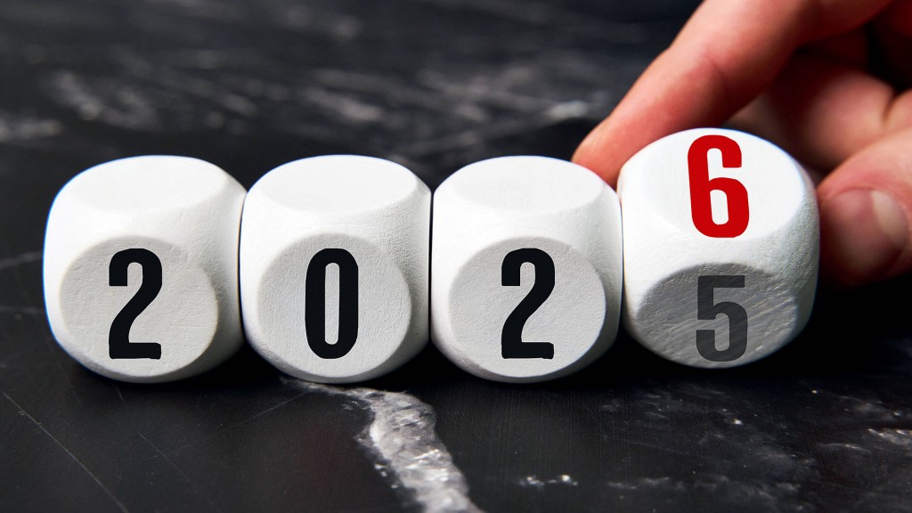Würfel symbolisieren den Jahreswechsel von 2025 auf 2026