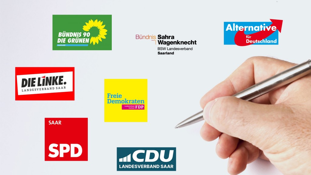 Symbolbild: Eine Hand mit Kugelschreiber neben den Logos der im Saarland vertrenen Parteien