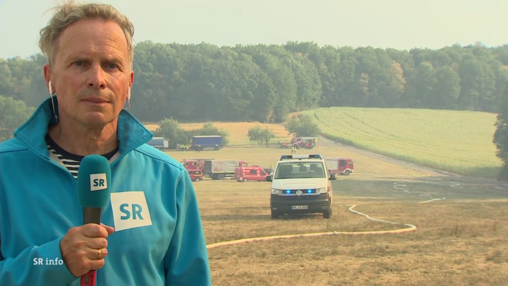 Foto: Jürgen Rinner beim Waldbrand bei Hüttigweiler