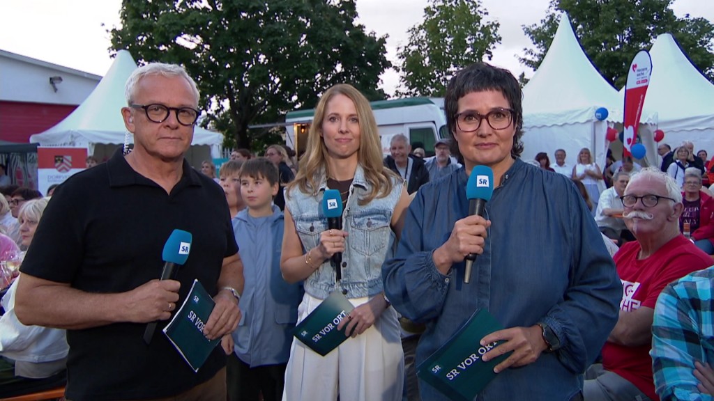 Foto: Joachim Weyand, Julia Lehmann und Sonja Marx beim aktuellen bericht bei SR vor Ort in Bliesmengen-Bolchen 