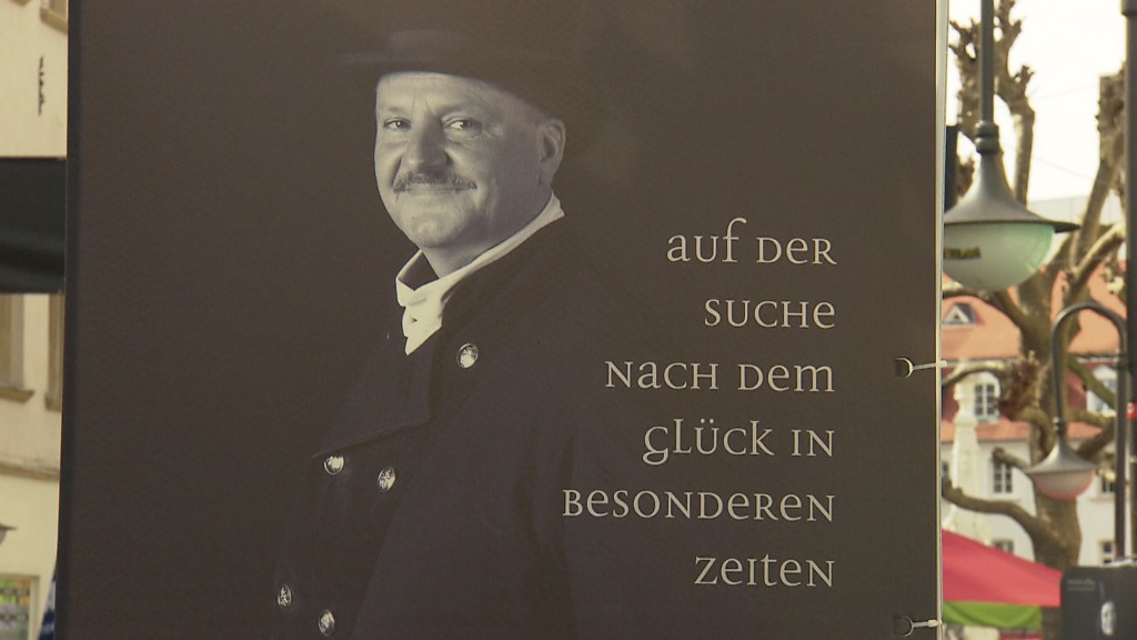 Foto: Schornsteinfeger auf einem Poster