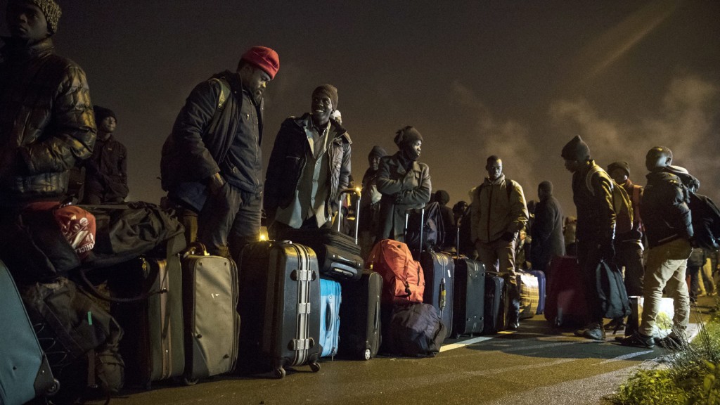 Flüchtlinge aus dem Flüchtlingslager in Calais (Foto: dpa)