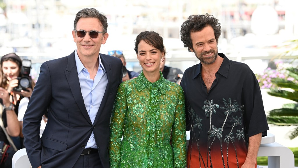 Regisseur Michel Hazanavicius, Berenice Bejo und Romain Duris stehen beim Fotocall für den Film 
