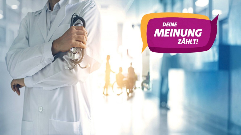Foto: Ein Arzt steht in einem Krankenhausflur
