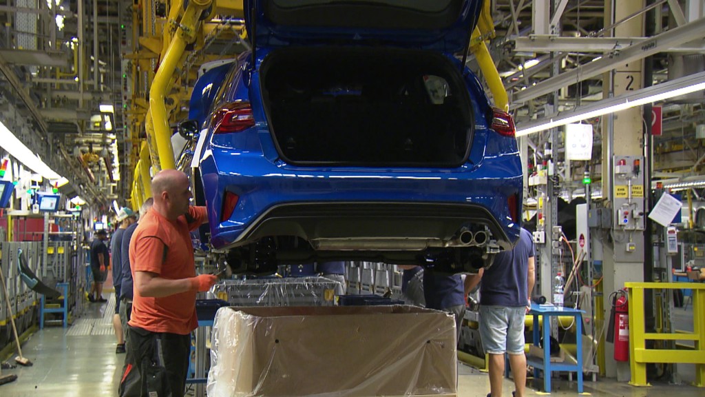 Foto: Ford-Mitarbeiter in der Produktionsstätte