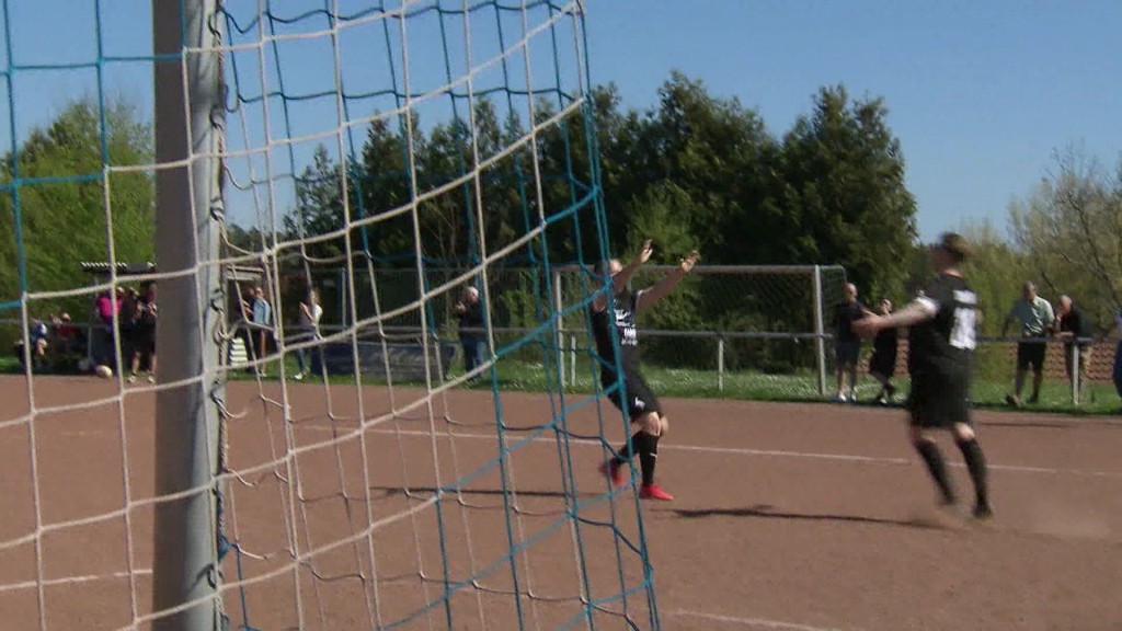 Foto: Fußballer auf dem Sportplatz