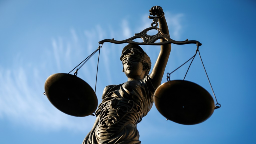 Symbolbild: Prozessauftakt - Justitia