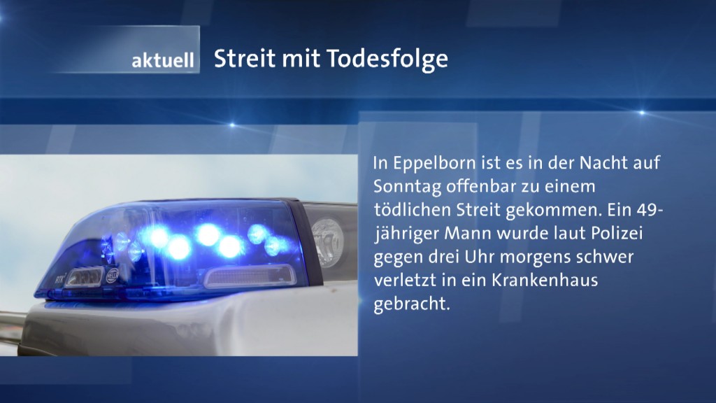 Foto: Blaulicht neben einer Texttafel