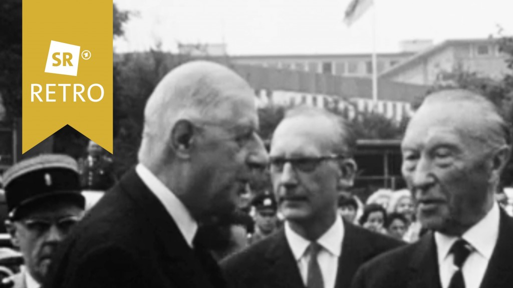 Adenauer und de Gaulle geben sich die Hand