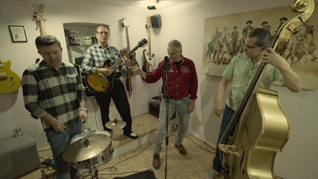 Foto: Elvis-Fans und -Band