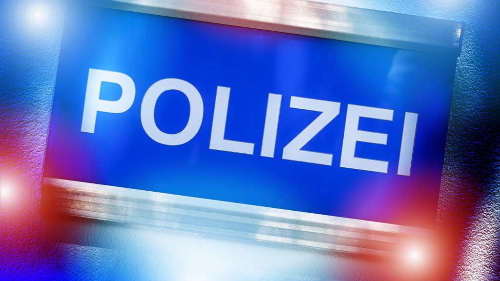 Polizei-Schild mit Blaulicht 