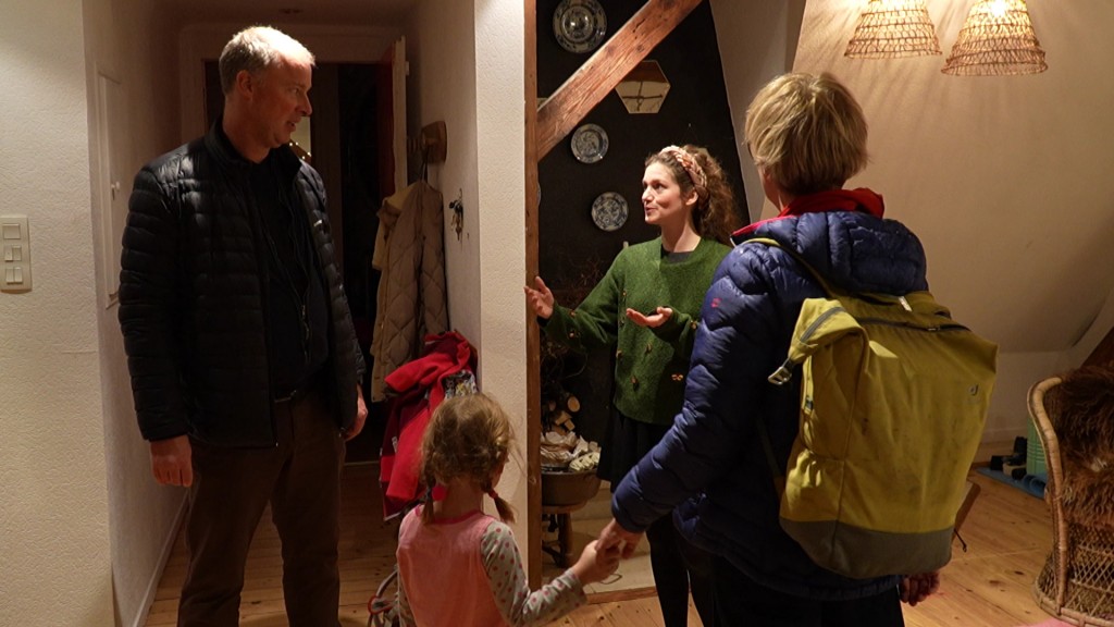 Foto: Familie beim Haustausch