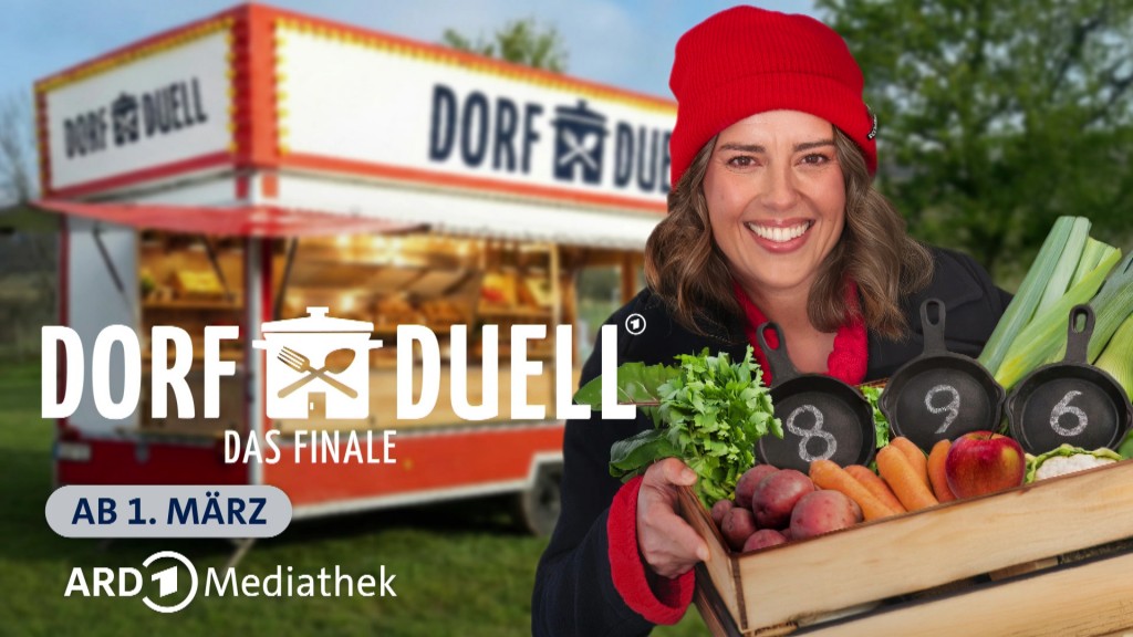 Foto: Simin Sadeghi hält eine Kiste mit frischem Gemüse vor dem Dorf-Duell-Wagen auf einer Wiese