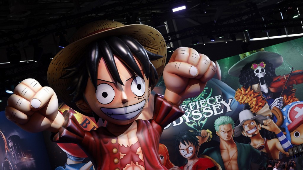 Eine übergroße Figur von Monkey D. Ruffy bewirbt das Videospiel One Piece Odyssey